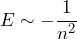 E \sim - \dfrac{1}{n^2}